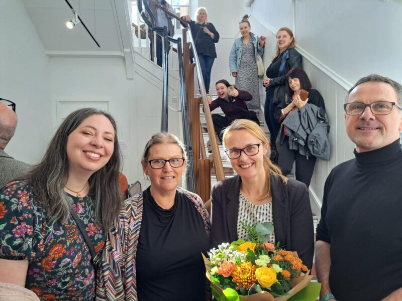 Cat with the Assembly Arts Team